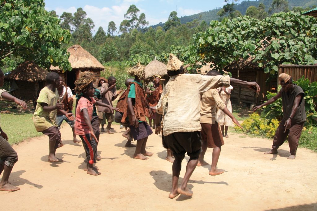 Batwa people in a traditional dance. An experience at Boma Cultural Village